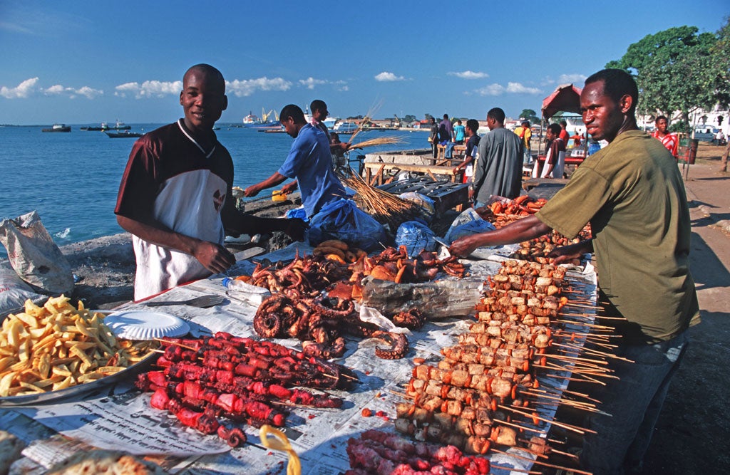 Come and get it: Stalls of freshly cooked seafood on the waterfront at Forodhani Square