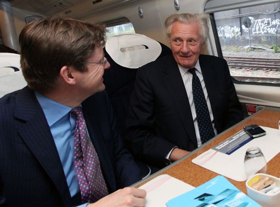 The Minister for Cities, Greg Clark, with Lord Heseltine on the train to Birmingham. Lord Heseltine likened the question of the Mayor of Birmingham's powers to that of Alex Salmond in Scotland