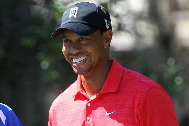 Winning smile: Woods reclaims his old position as Augusta favourite