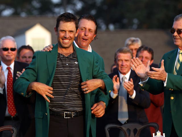 If the coat fits: Charl Schwartzel wins the 2011 Masters