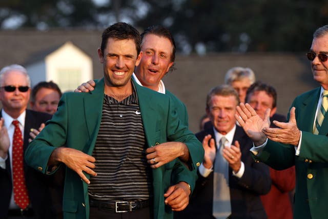 If the coat fits: Charl Schwartzel wins the 2011 Masters