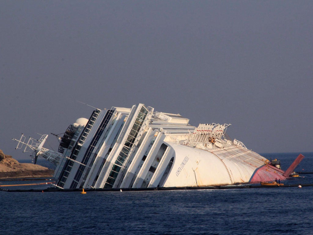 The Costa Concordia lies stricken after hitting a rock