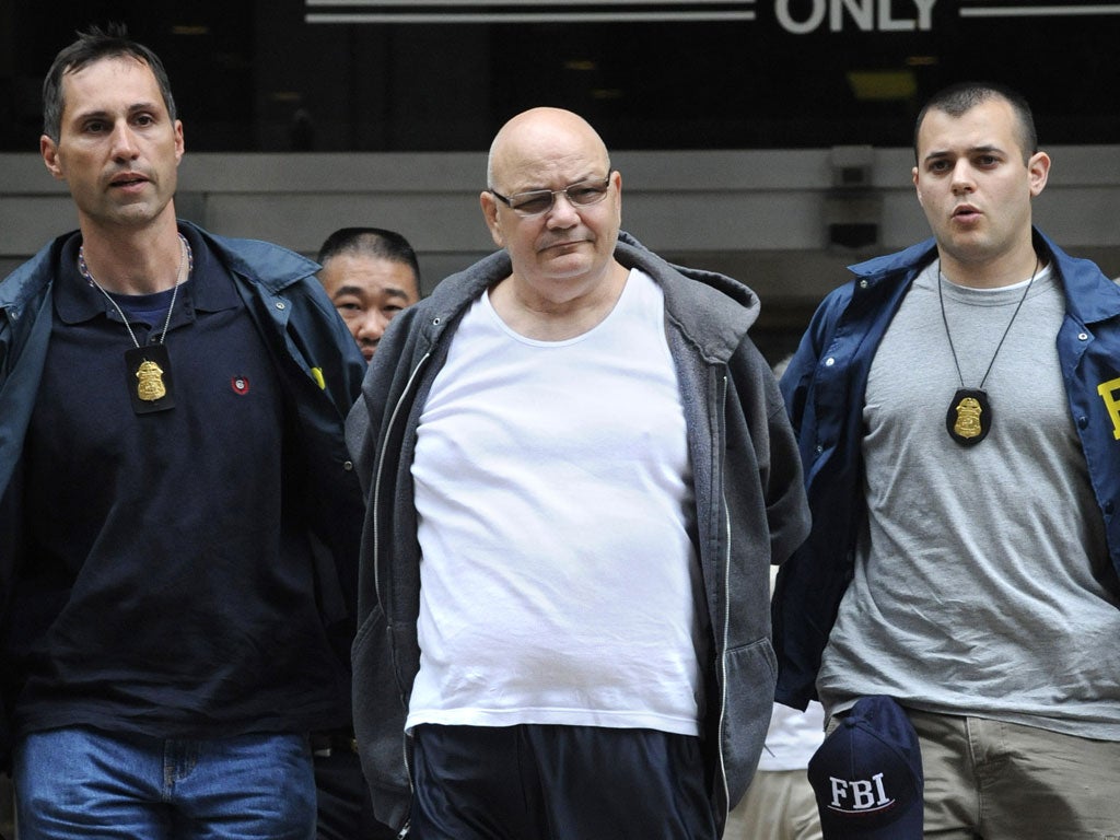 Thomas 'Tommy Shots' Gioeli, an alleged Mafia boss turned blogger, is led to jail in 2008