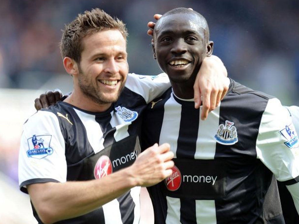 Striker Papiss Cissé (right) was the two-goal hero for Newcastle