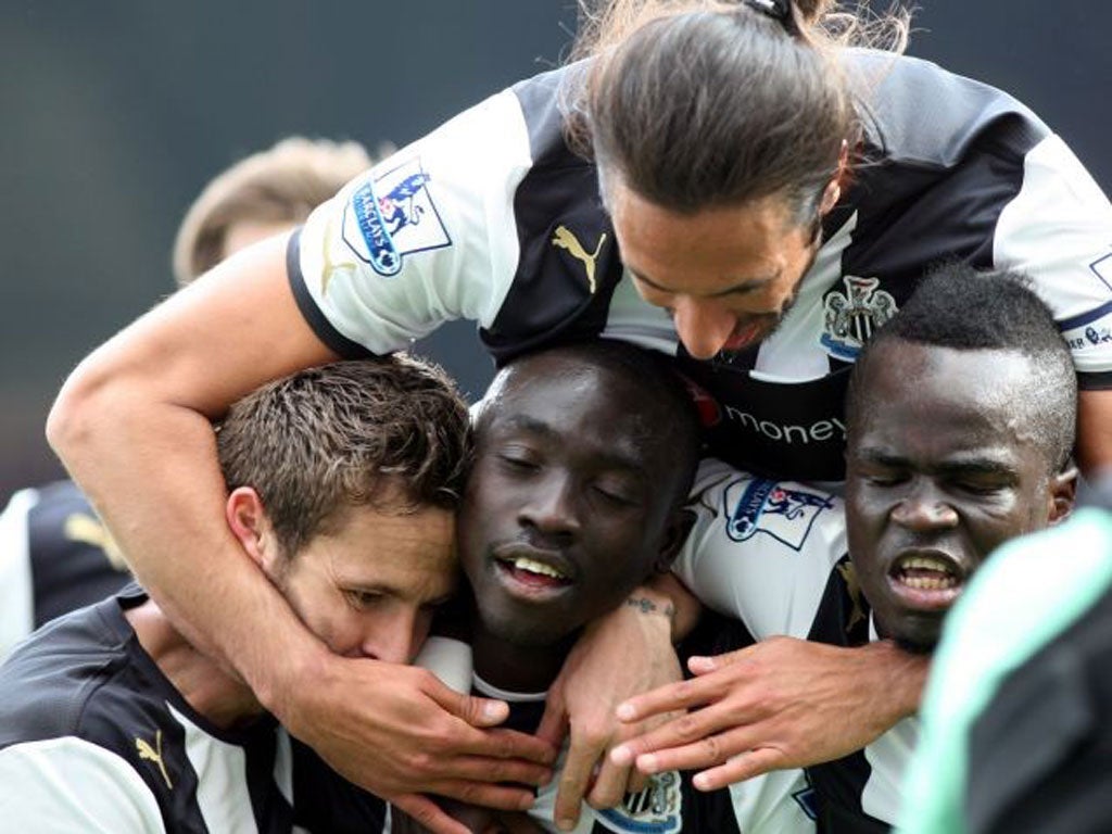 Newcastle’s players celebrate victory over Liverpool