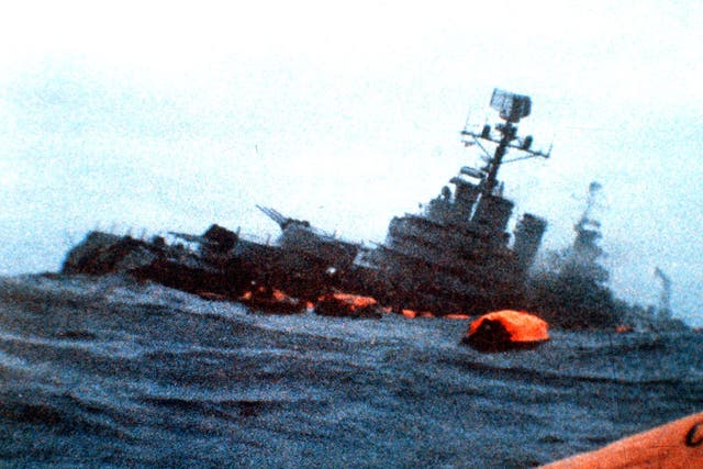 The Belgrano sinks amid orange life rafts holding
survivors in the South Atlantic in May 1982