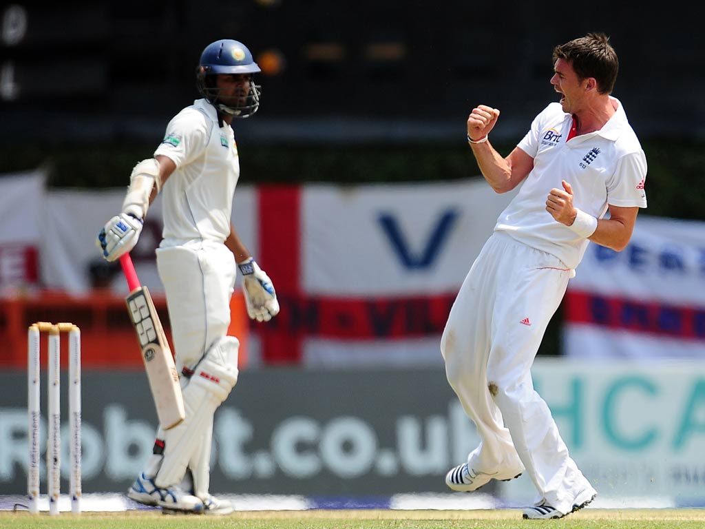 England cricketer James Anderson (R) celebrates his dismissal of Sri Lankan batsman Lahiru Thirimanne