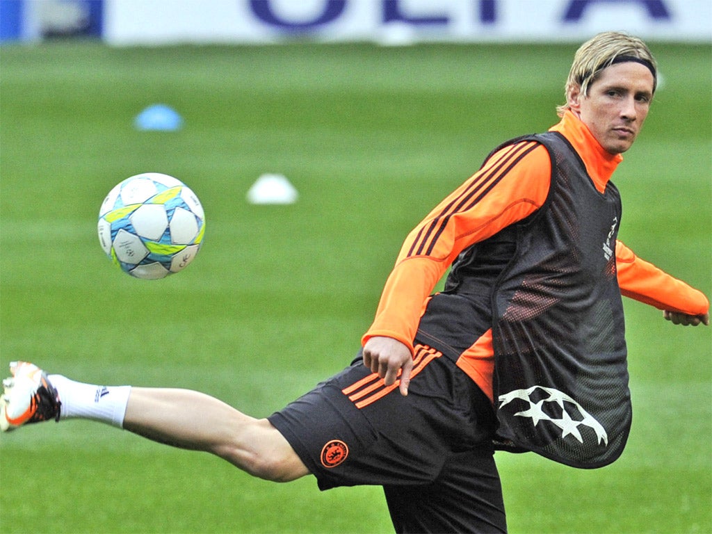 Fernando Torres shows close control during training at Stamford Bridge yesterday