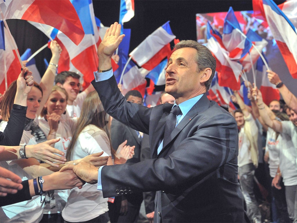 Out on the campaign trail, President Sarkozy is cheered by supporters in Nancy