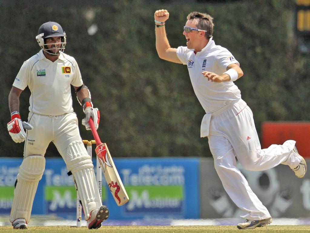 England's bowler Graeme Swann celebrates the wicket of Sri Lankan batsman Anjelo Mathews