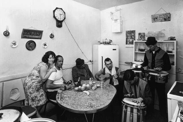 An impromptu jam session at home in East Harlem. Davidson began shooting there in September 1966, when it was still a ghetto