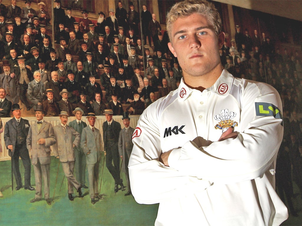 Rory Hamilton-Brown in front of a painting showing previous Surrey captains at The Oval
