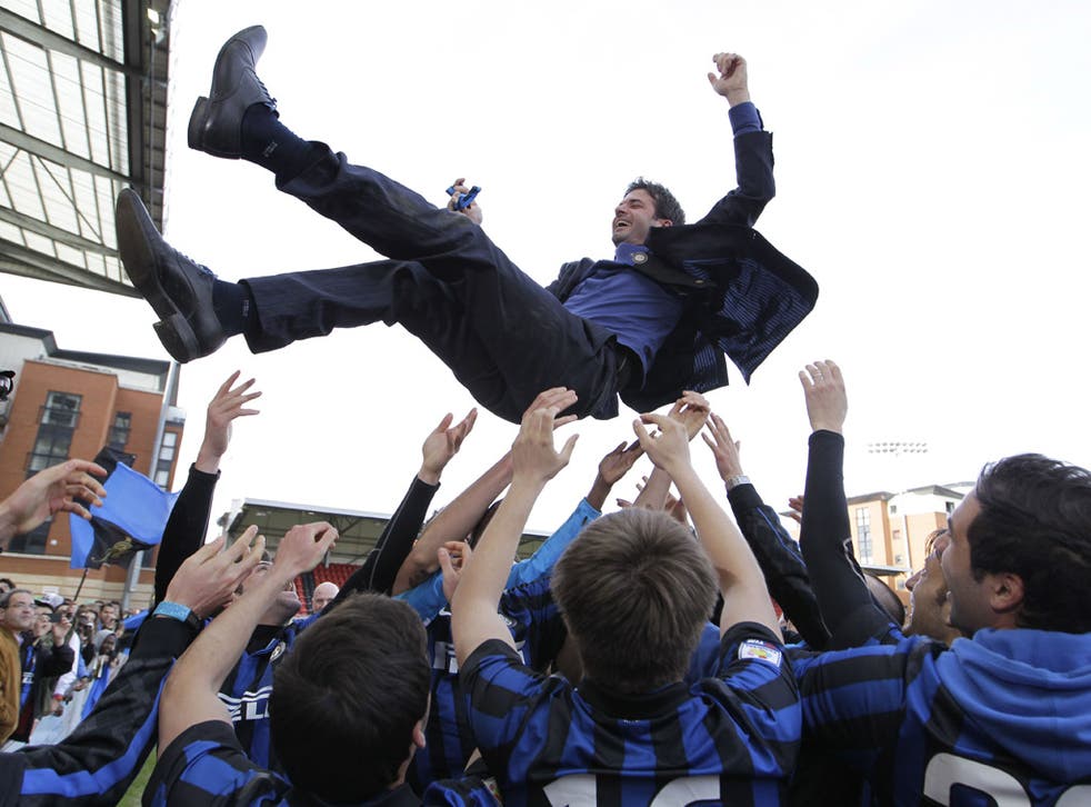 Internazionale's youth-team coach, Andrea Stramaccioni, is thrown into the air by his players after they won the NextGen Series final by beating Ajax at Leyton Orient's Brisbane Road. Stramaccioni is now first-team manager