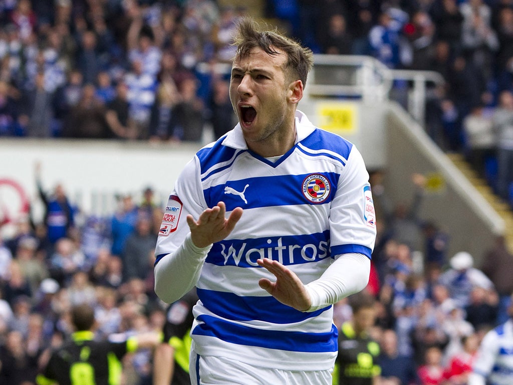 Reading’s Adam Le Fondre scored both goals in the hard-fought win over Leeds