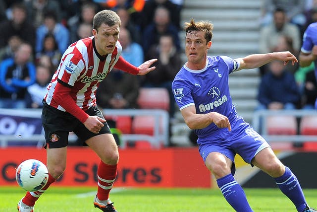 Tottenham's Scott Parker, right, vies with Sunderland midfielder Craig Gardner