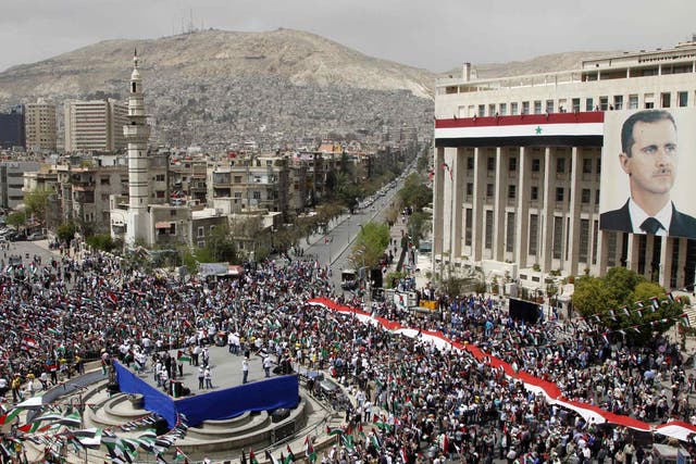 A rally in Damascus yesterday to celebrate the 65th anniversary of the ruling Ba'ath Party
