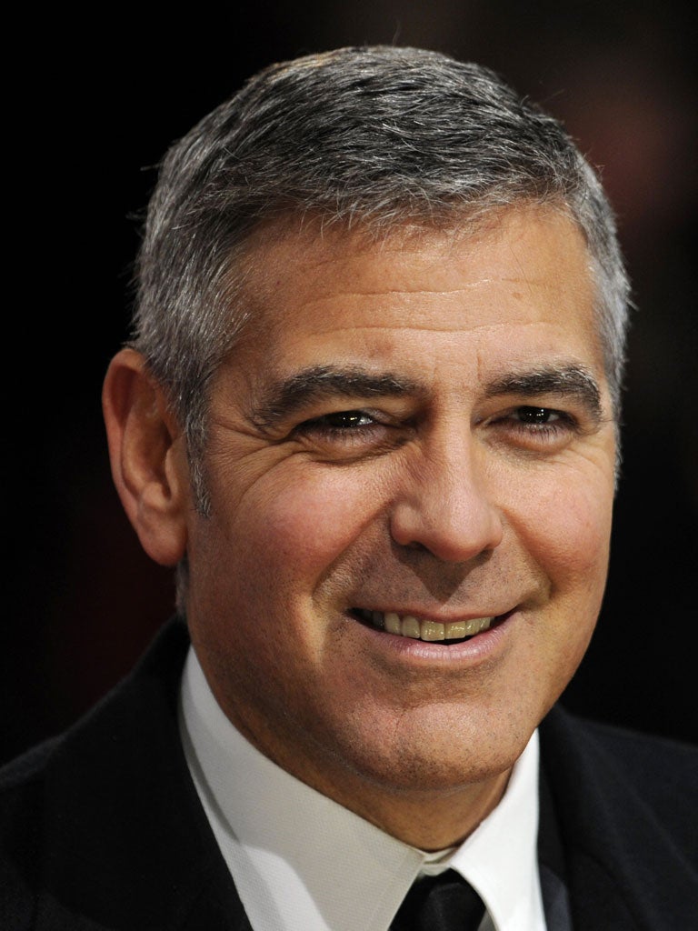 Regular Guy: The even features of film star George Clooney give him a natural edge