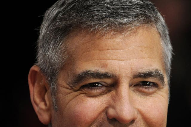 Regular Guy: The even features of film star George Clooney give him a natural edge