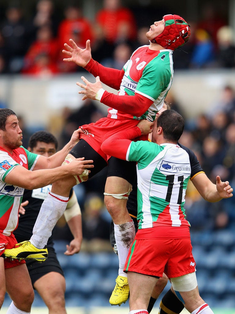 Big Ben: Biarritz's Benoît Guyot jumps for the ball during the win over Wasps