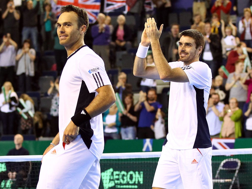 Double top: Ross Hutchins (left) and Colin Fleming celebrate victory