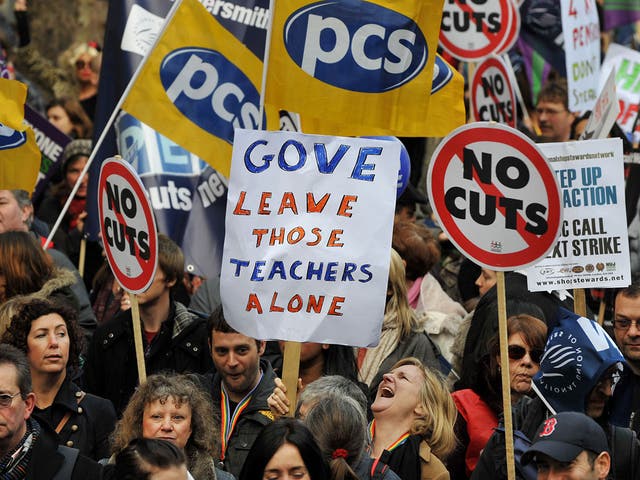 Teachers and lecturers held a one-day strike in London over staff and pension cuts in 2012