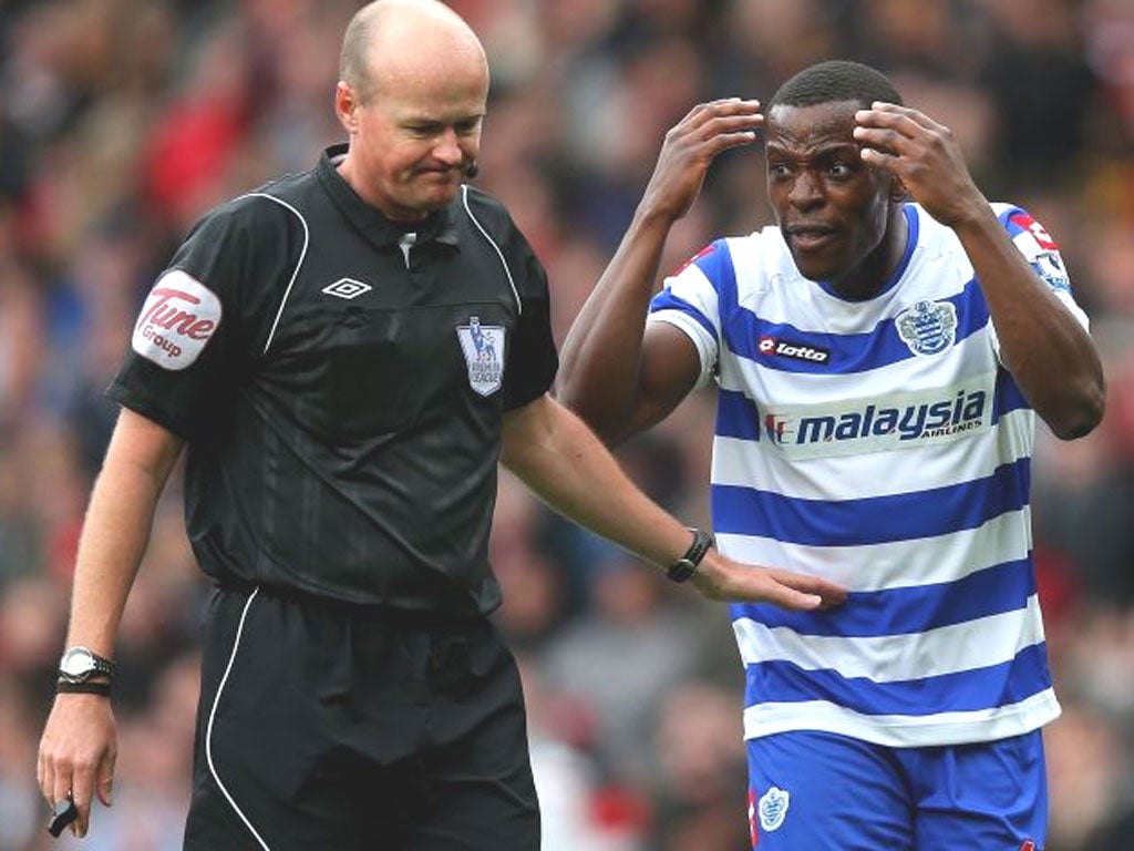 QPR’s Nedum Onuoha reacts in incredulous fashion at referee Lee Mason’s awarding of the penalty at Old Trafford yesterday