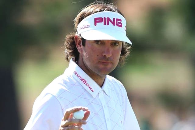 American Bubba Watson gestures after a putt on the 13th hole during the final round of the 2012 Masters Tournament at Augusta National Golf Club