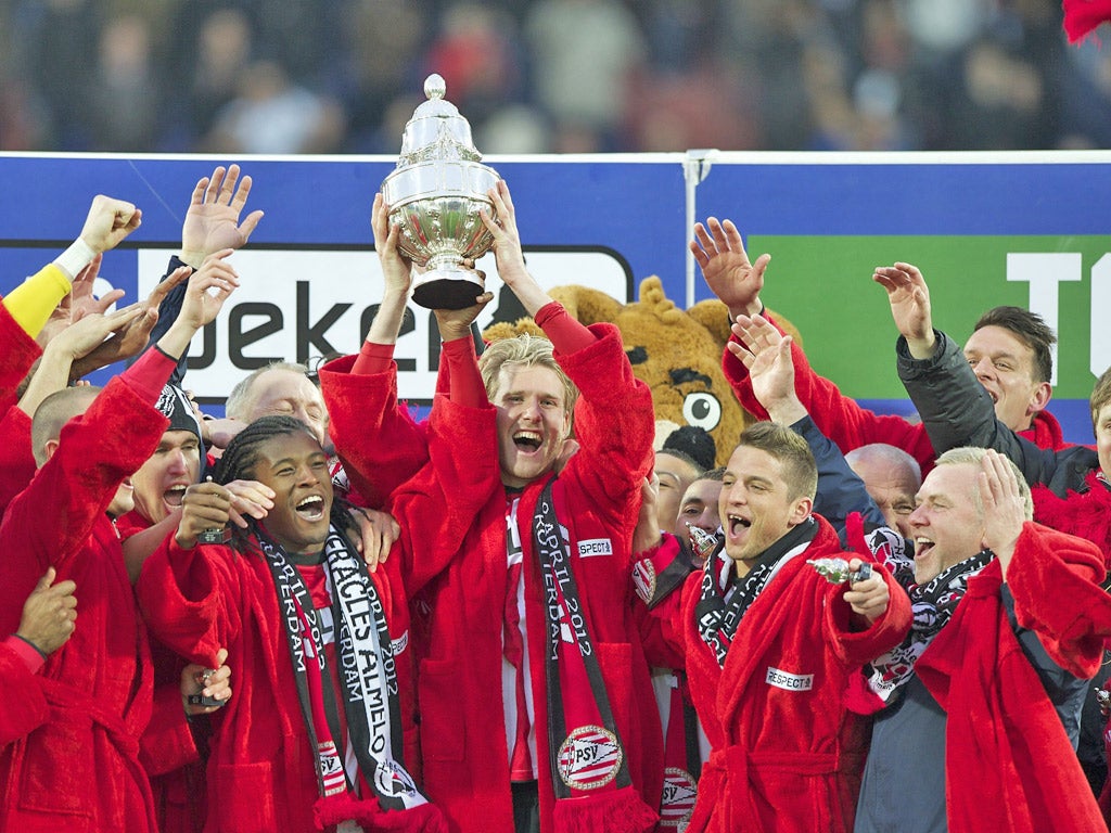 PSV players celebrate their triumph