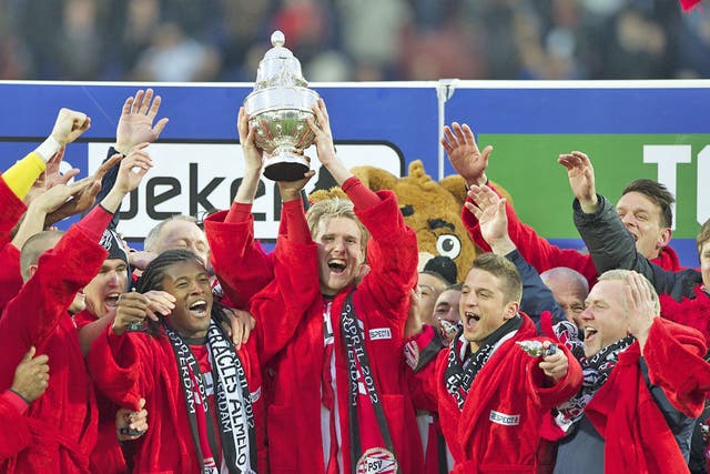 PSV players celebrate their triumph