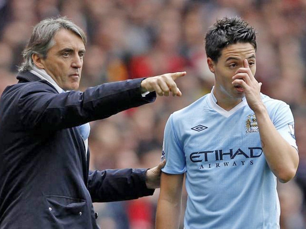 Arsenal have lost Gael Clichy, Kolo Toure and Samir Nasri to Roberto Mancini's men