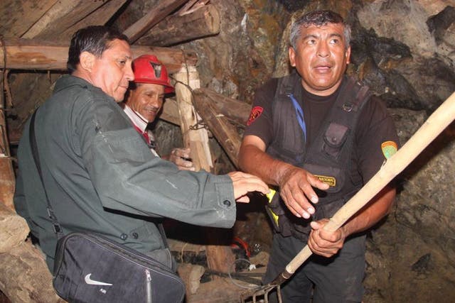 Rescue workers in the collapsed mine 