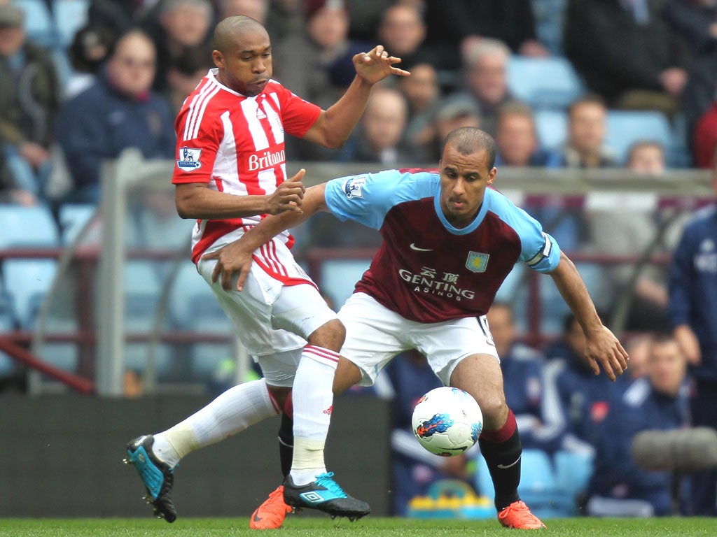 Stoke’s Wilson Palacios (left) challenges Aston Villa’s Gabriel Agbonlahor