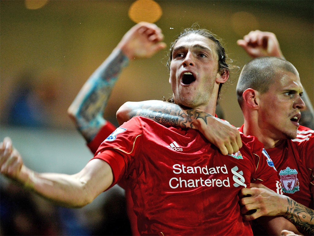 Andy Carroll celebrates his winner with Martin Skrtel
