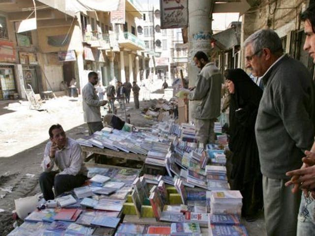 A man sells second-hand books in Mutanabbi Street in Baghdad
