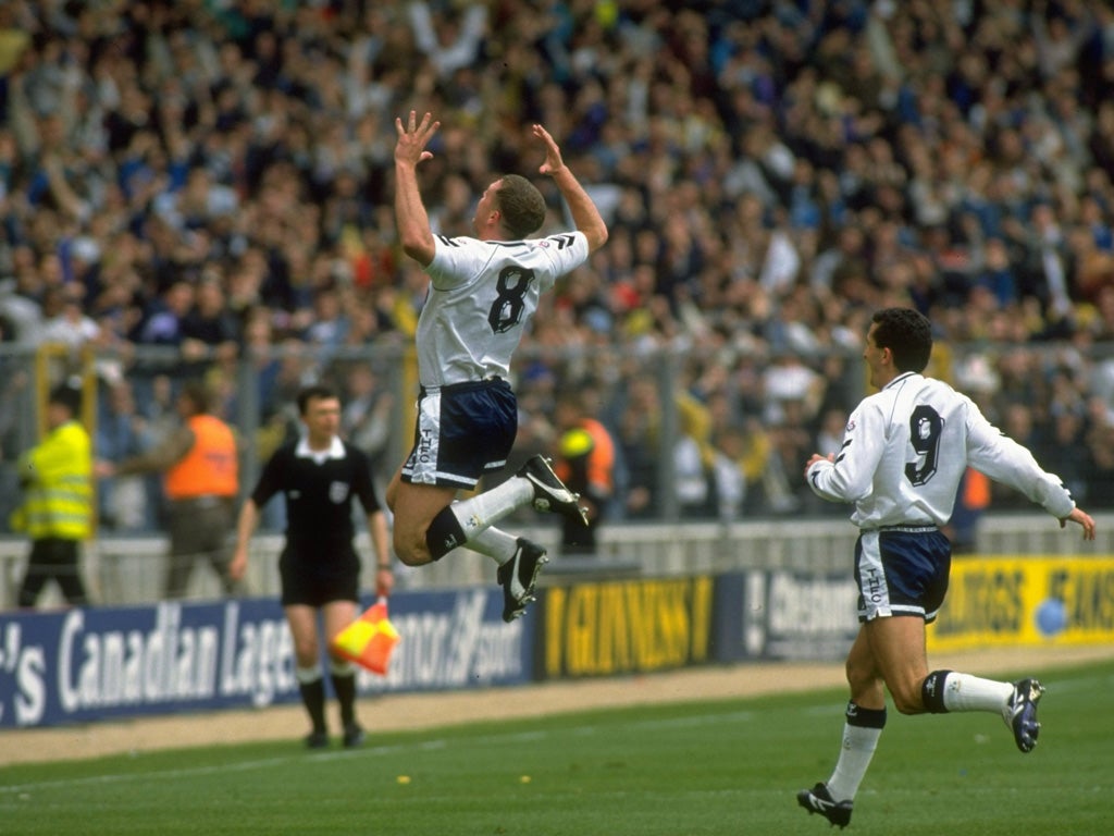 Paul Gascoigne celebrates scoring from a free-kick against Arsenal in 1991