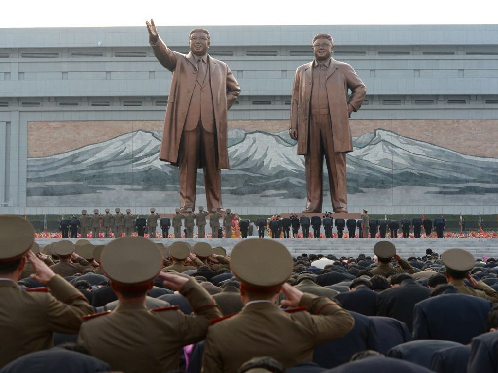 Statues of North Korea's late leader, Kim Il-sung, left, and Kim Jong-il were unveiled in Pyongyang yesterday