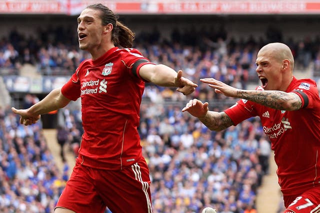Andy Carroll celebrates with Martin Skrtel
