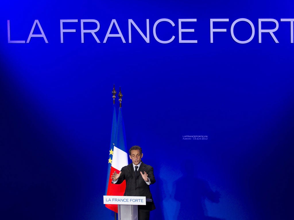 Against all odds: President Nicolas Sarkozy during a campaign rally in Corsica, on Friday; polls suggest that one in three far-right and centre voters prefer the socialist François Hollande