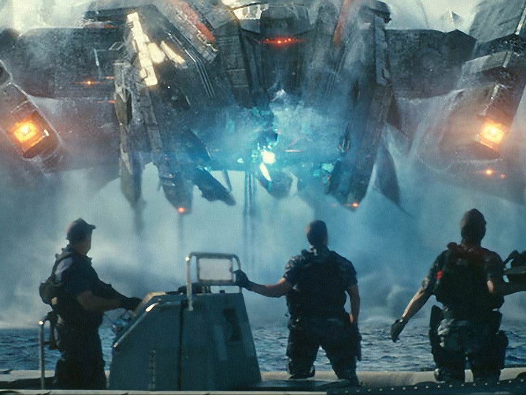 From left, John Tui, Taylor Kitsch and Rihanna in the super-violent Battleship