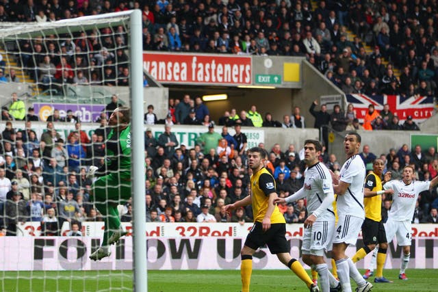 In the bag: Gylfi Sigurdsson (far right) scores the opener in Swansea's easy win