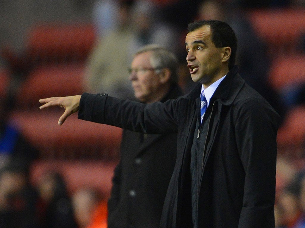 Just the job: Roberto Martinez masterminded a first success for Wigan over United last week