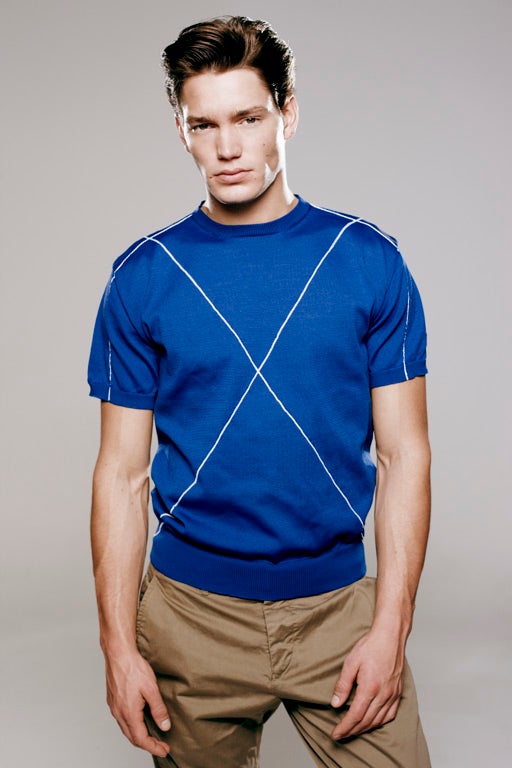 Short-sleeved sweater £225, Raf Simons, mrporter.com; trousers £89, Jigsaw Menswear, jigsaw.co.uk