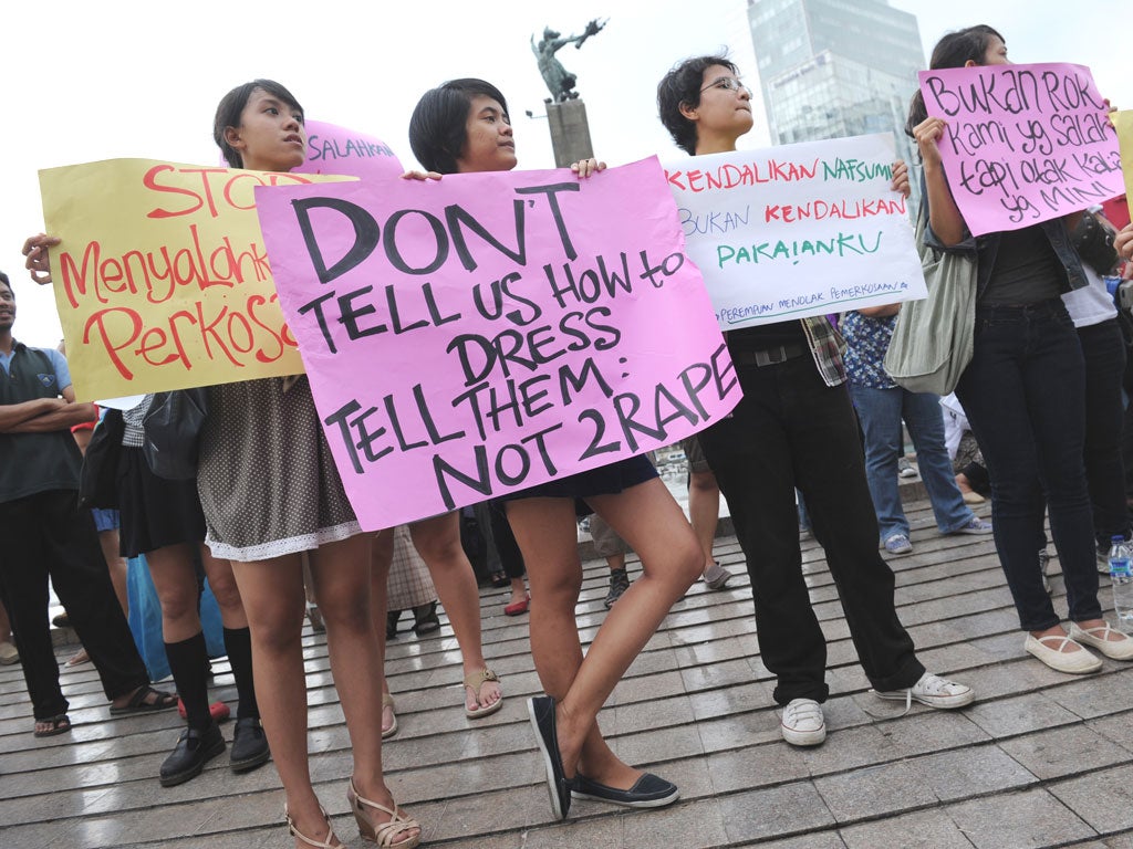 Women protest in Jakarta after comments by politicians who criticised a rape victim for wearing a miniskirt