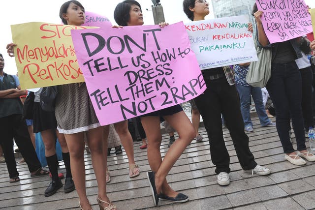 Women protest in Jakarta after comments by politicians who criticised a rape victim for wearing a miniskirt