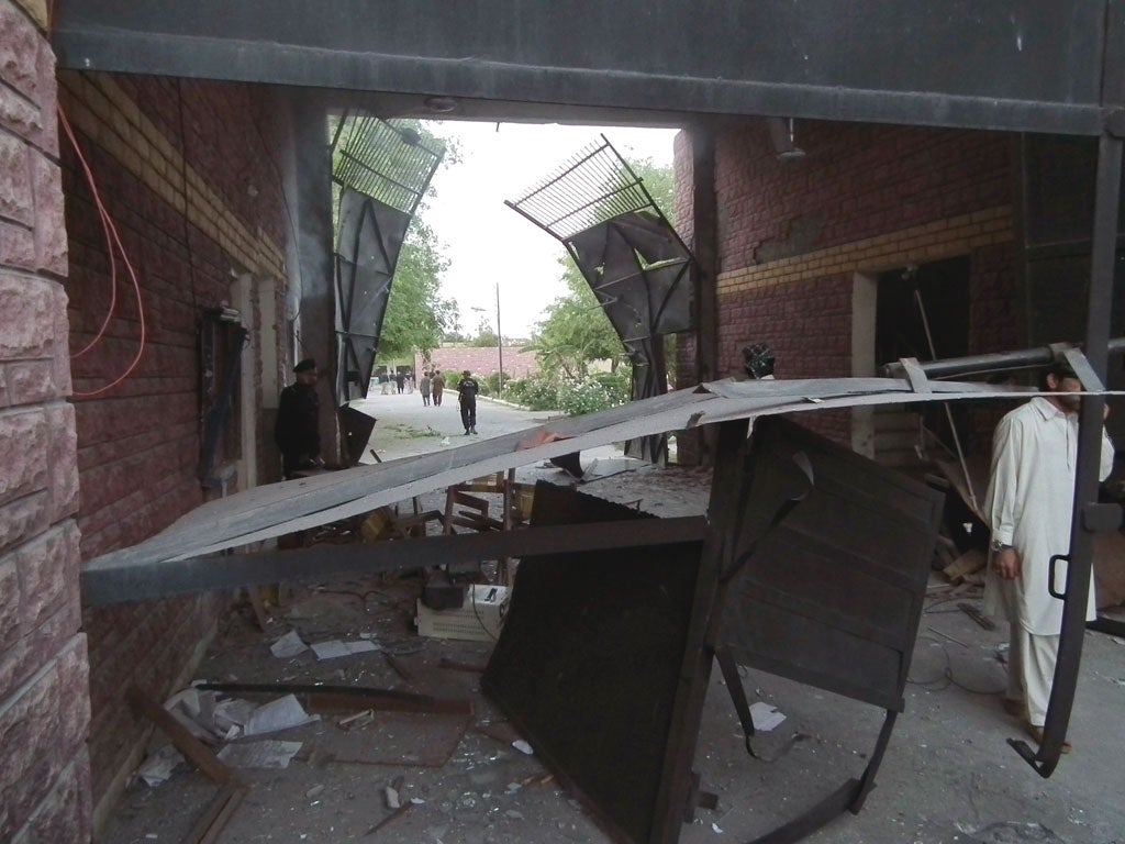 The prison in Bannu, Pakistan, after hundreds of inmates escaped following an attack by Taliban fighters yesterday