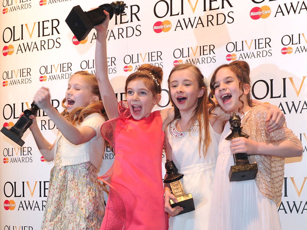 Cast members from Matilda the Musical, who each play Matilda on different nights, celebrate winning Best Actress in a musical at the Olivier Awards