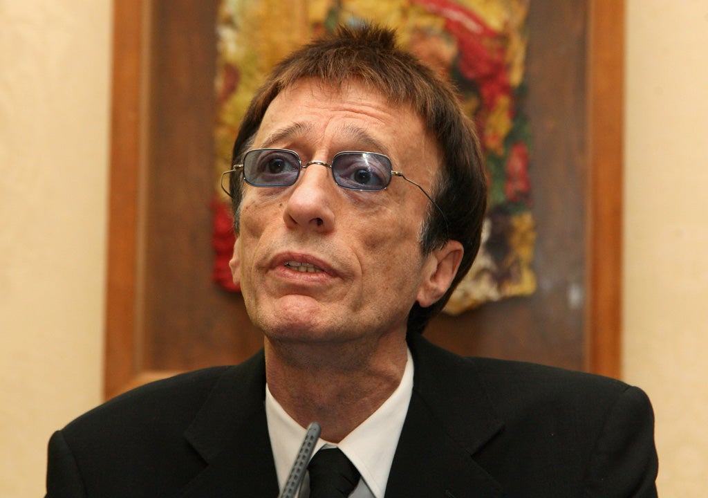 Robin Gibb has shown signs of recovery after waking from a coma