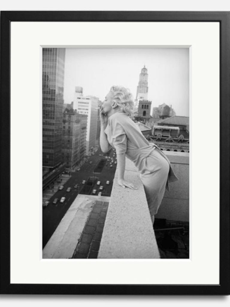 Marilyn Monroe on the balcony of the Ambassador Hotel, New York City, 1955