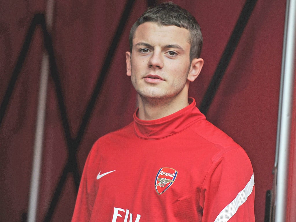 Wilshere had been playing on the left of a midfield three under Capello
