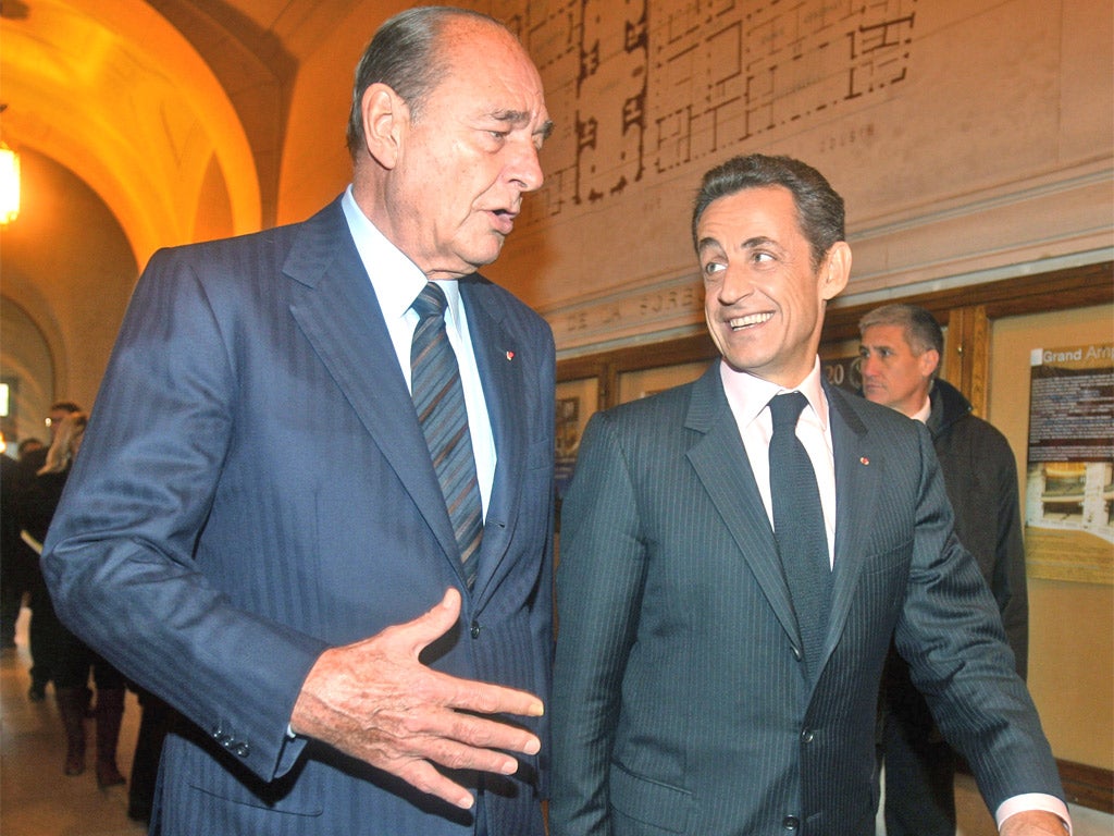 Former President Jacques Chirac and Nicolas Sarkozy